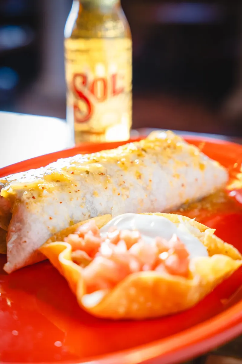 Burrito California with a fried tortilla bowl of pico de gallo