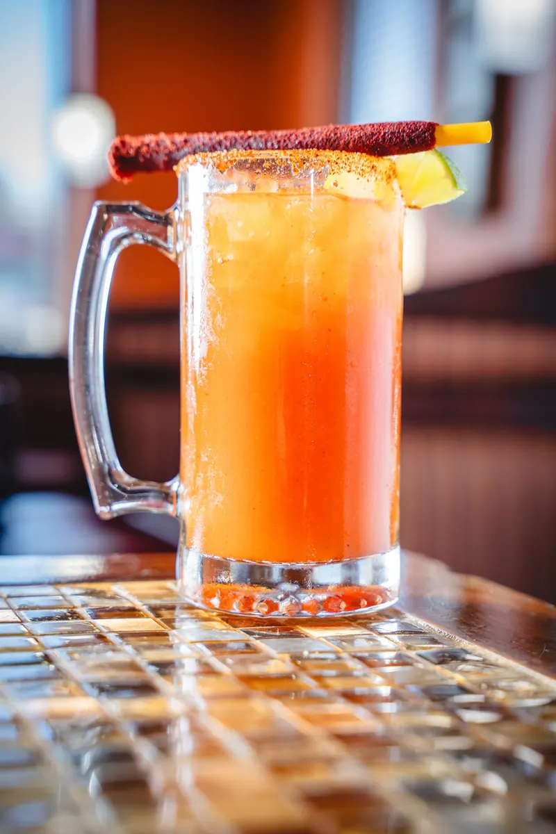 Michelada in a mug with a chile rim