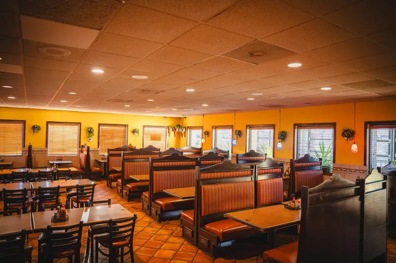 Monroe dining room with booths and windows