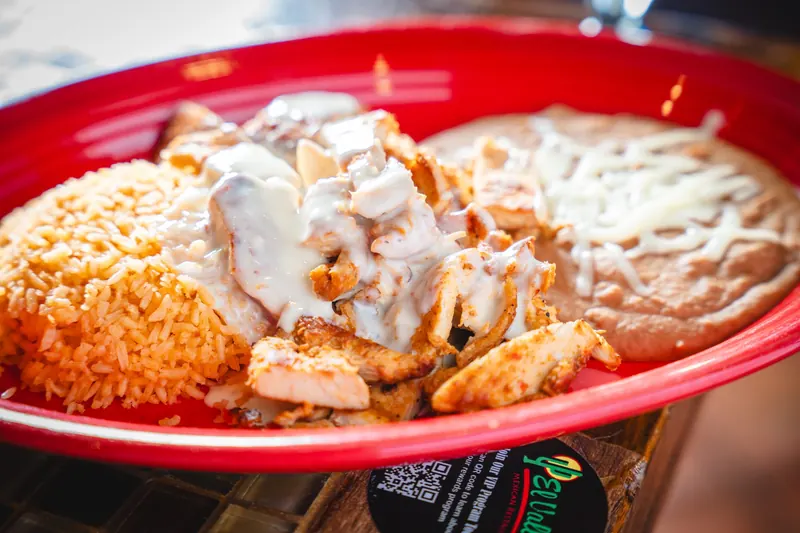 Pollo con Crema with rice