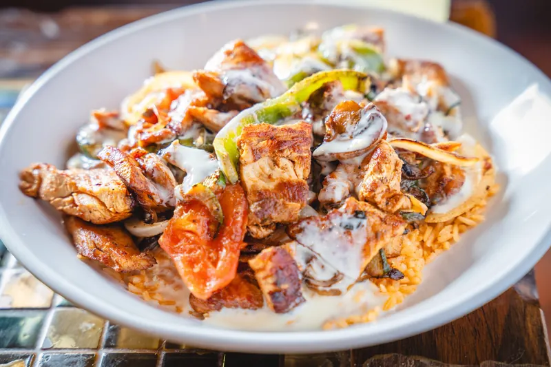 Ranchero Special with peppers, mushrooms and cheese sauce