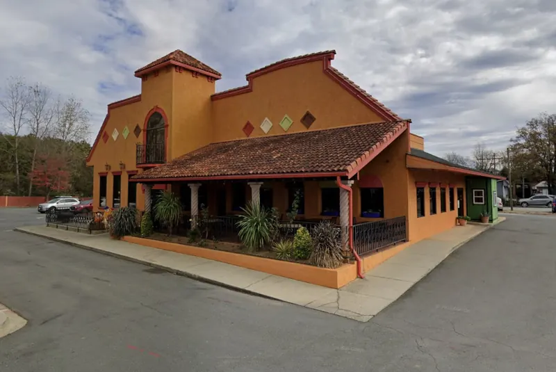El Vallarta Monroe adobe building with a red tile roof